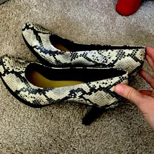 Clark’s snakeskin heels!